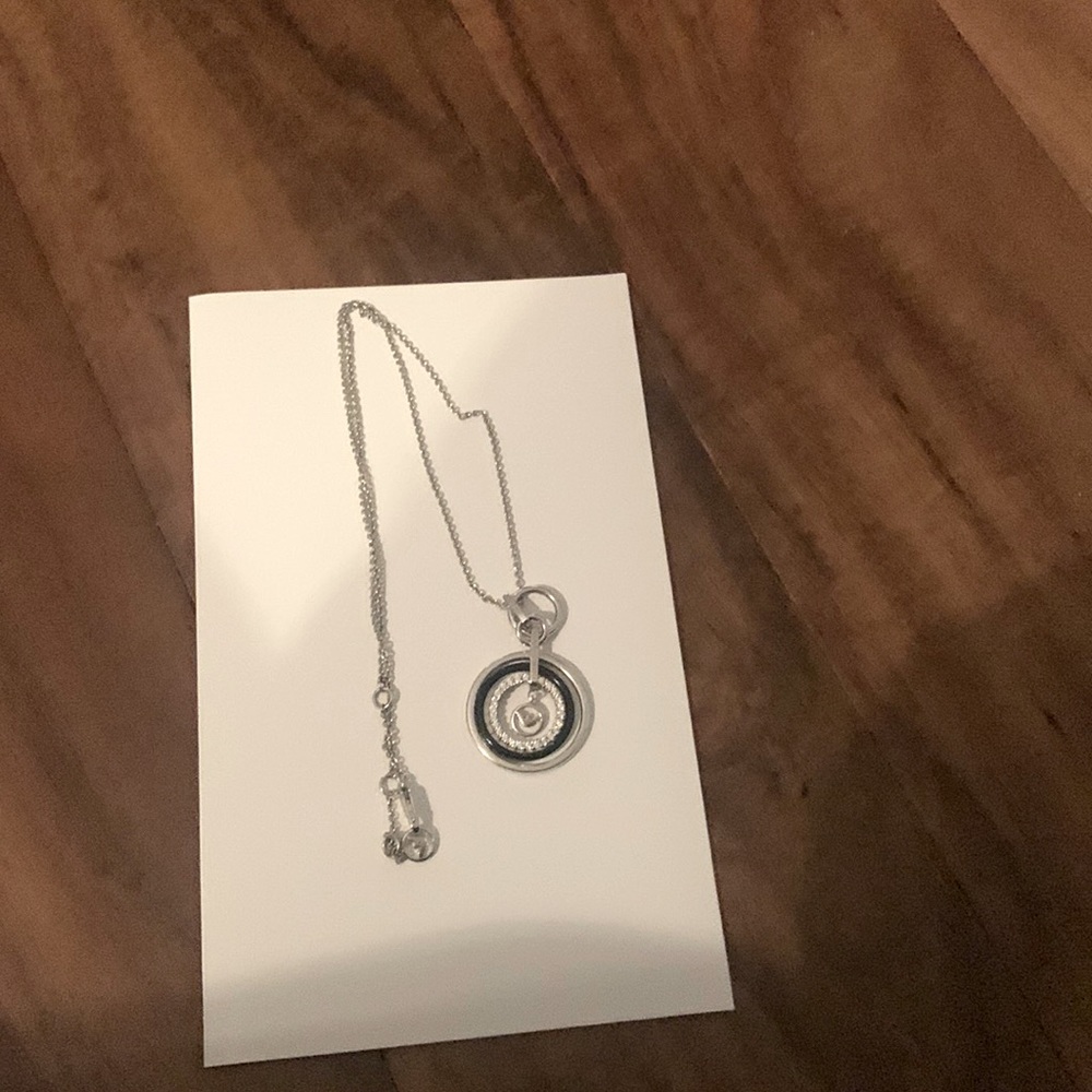 Armani necklace with logo circle pendant. Made with Swarovski.